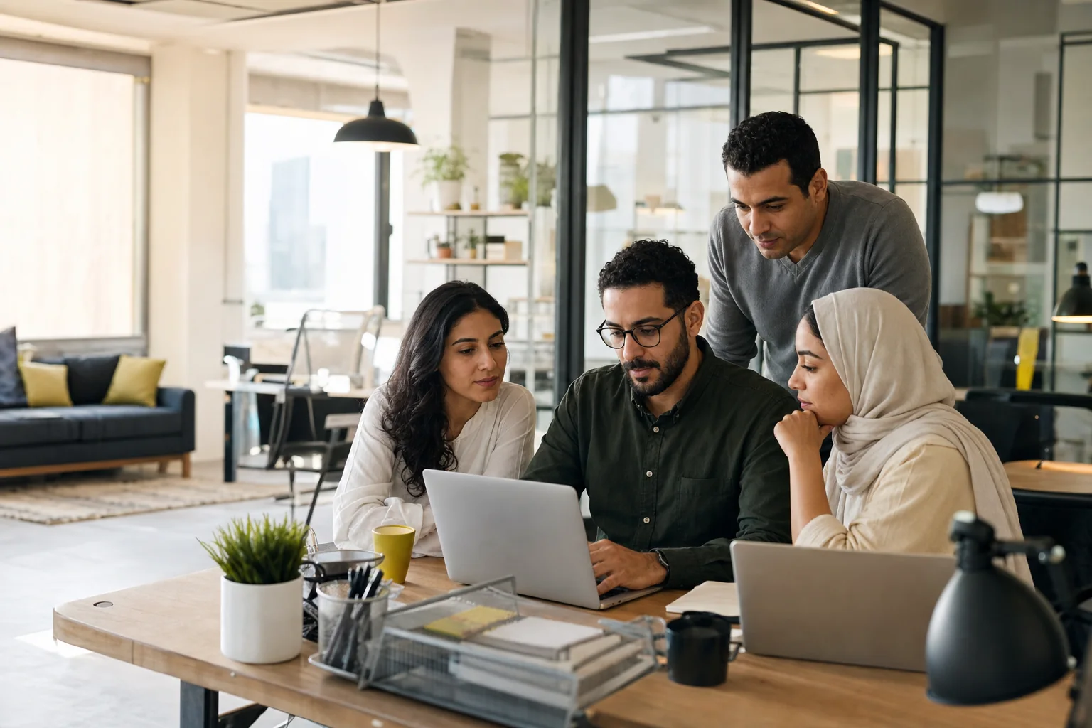 A dedicated Egyptian team collaborating in a fully equipped Cairo office